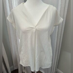 White Bobeau cuffed sleeve V neck top.